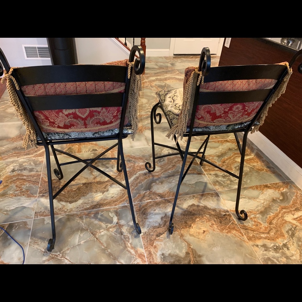 High chaired metal .  Very nice. Used